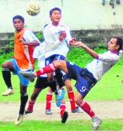 A match in the Nemi Dass District Super League in progress on the Parade Ground in Dehradun on Saturday.