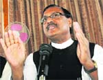 Satya Pal Jain, former BJP in charge of Himachal affairs, addressing the media at Shimla on Saturday. 