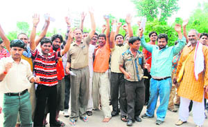 Amarnath pilgrims protest against inadequate arrangements at the Yatri Niwas at Bhagwati Nagar in Jammu on Saturday.