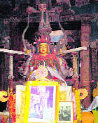 The mud walls and the rare thangka paintings (L) of the monastery are in danger due to the seepage of moisture