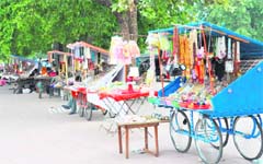 Vendors wait for customers ahead of the Kanwar season which begins from July 26. 