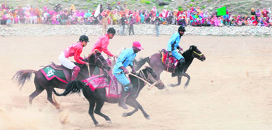 Players of Drass and Kargil play a friendly polo match organised by the Army on the eve of Vijay Diwas in Drass on Sunday.