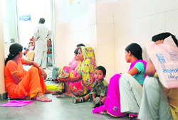 Patients wait for their turn in front of doctors room at gynae ward of the Government Multi-Speciality Hospital, Sector 16, Chandigarh.