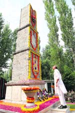 Minister of State for Defence MM Pallam Raju pays tributes at the war memorial in Badami Bagh Cantonment in Srinagar.
