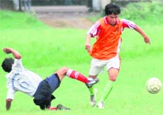 A match in progress at the Nemi Dass District Super League in Dehradun on Tuesday.