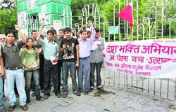 Members of the AISF hold a rally at the Gandhi Park in Dehradun on Tuesday.