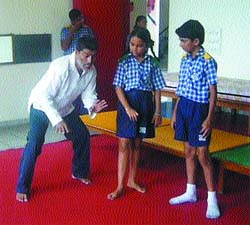 Dramatist Probir Guha instructs students during the workshop at Eklavya School in Jalandhar