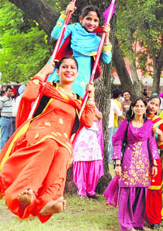Girls celebrate Teej on the campus of Punjabi University, Patiala, on Tuesday.