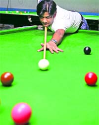A player during the Haryana State Billiards and Snooker Championship at Haryana Billiards in Chandigarh on Wednesday