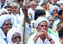 Jats take part in a rally near Parliament to demand OBC status for the community, in New Delhi