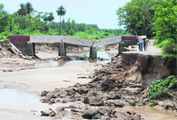 The broken Dadupur Nalvi canal bridge.