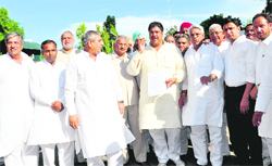 INLD secretary-general Ajay Chautala, along with a party delegation, comes out of Haryana Raj Bhawan after submitting a memorandum to the Governor in Chandigarh 