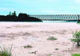 The water level in the Chenab in Akhnoor which has risen after a heavy rain on Wednesday.