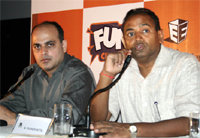 Rajinder Mittal (right) of Mittals City Mall addressing media during the launch of Fun Cinemas in Bathinda on Thursday. Also seen in the picture is Deepak Taluja, senior vice-president, business and operations, Fun Cinemas