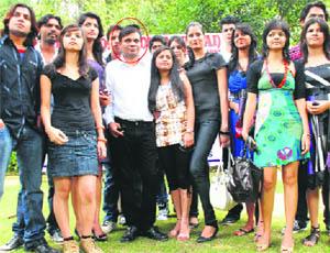 Sanjay Mishra (encircled) at a press conference with budding actors at the Press Club on Monday.