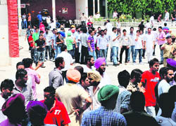 PUSU and SOPU supporters indulge in pre-election war of words at DAV College, Sector 10, Chandigarh, on Thursday.