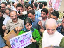 PDP president Mehbooba Mufti and other party leaders protest outside the Civil Secretariat complex in Srinagar against civilian deaths on Thursday