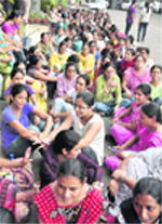 Students stage a protest outside the Vice-Chancellors office at PAU in Ludhiana 