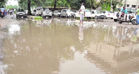 The road in front of Bachat Bhawan inside the mini secretariat is waterlogged just after brief showers in Ludhiana.