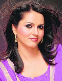 Charming anchor Baljit Johal (above) seemed subdued while interviewing singer Raj Kakra