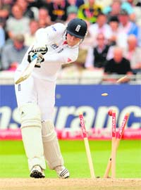 Stuart Broad is bowled by Umar Gul