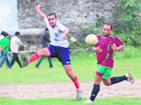 A match in the Nemi Dass District Super League being played on the Pavilion Ground in Dehradun on Saturday.