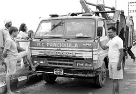 Irate residents prevent an MC garbage truck from leaving the dumping ground in Sector 23, Panchkula, on Sunday.