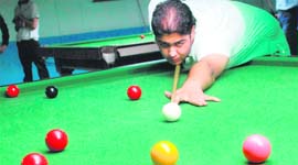 Snooker player Karan Dhir plays a shot during the Haryana ranking championship at Panchkula on Sunday.