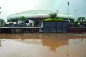 Waterlogging in front of the weightlifting auditorium at the Jawaharlal Nehru Stadium complex that was inaugurated in New Delhi