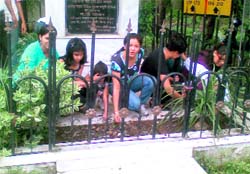 Members of the DSI Foundation and St Josephs alumni clean a martyrs memorial in Dehradun on Sunday.