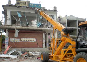 The illegal building near Hanuman chowk in Bathinda being demolished
