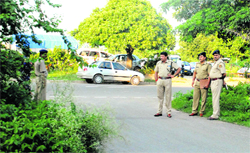 Police officials inspect the crime scene near Sector 38 (West), Chandigarh,
