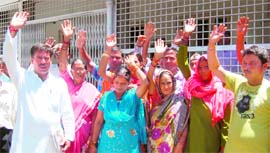 Residents of Gohari Mafi village protest at the office of the District Magistrate in Dehradun on Monday.