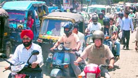 A traffic jam on a main road in Dehradun.