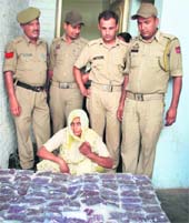 A woman smuggler in the custody of the Jammu police.
