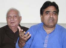 Madan Lal Kapoor (left) and DP Chandan, chairman and vice-chairman of the Small Traders Board, Punjab, respectively, addressing the media in Bathinda on Tuesday