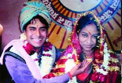 File photo of Rajesh SIngh Negi with his wife Bhawna.