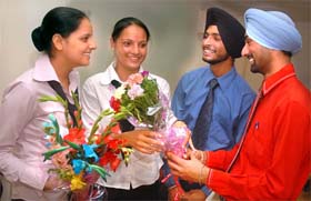 JUST FRIENDS: Boys present bouquets to their co-trainees celebrate Friendship Day at the Frankfinn Institute in Jalandhar