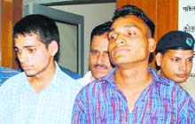 The two accused in police custody in Dehradun on Tuesday. 