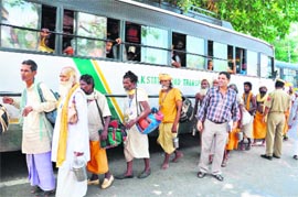 Sadhus leave for Pahalgam and Baltal on their journey to the Amarnath cave shrine from Parade in Jammu on Wednesday.