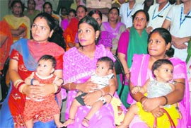 Women participate in a seminar in Government Gandhi Nagar Hospital in Jammu on Wednesday, in connection with the breastfeedding week.