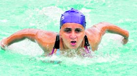 A player in action during the Inter-College Swimming Championship in Chandigarh on Thursday.