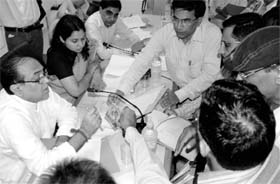 Haryana Finance Minister Capt Ajay Singh Yadav listens to the grievances of people in Panchkula on Thursday.