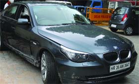 A BMW car rammed into a footpath at Shanti Path in New Delhi