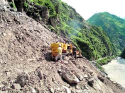 A landslide at Chautuldhar in Pitthoragarh district that has cut off a strategically vital road