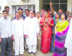 Finance Minister Ajay Singh Yadav along with the newly elected president and vice-president of the Rewari Zila Parishad.