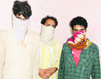 Alleged thieves (from left; Balwinder Singh, alias Suraj, Naresh, alias Fauji, and Dalip Singh) in RPF custody in Ludhiana.