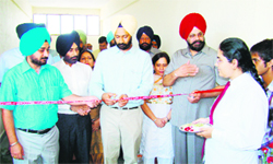 Punjab PWD Minister Parminder Singh Dhindsa inaugurates the MBA block of a private college near Tangori. 