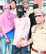 Two snatchers arrested by Mohali police on Friday. @@A Tribune photograph