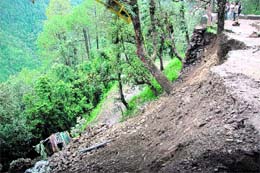 A truck fell down due to a landslide near Summer Hill in Shimla on Friday.